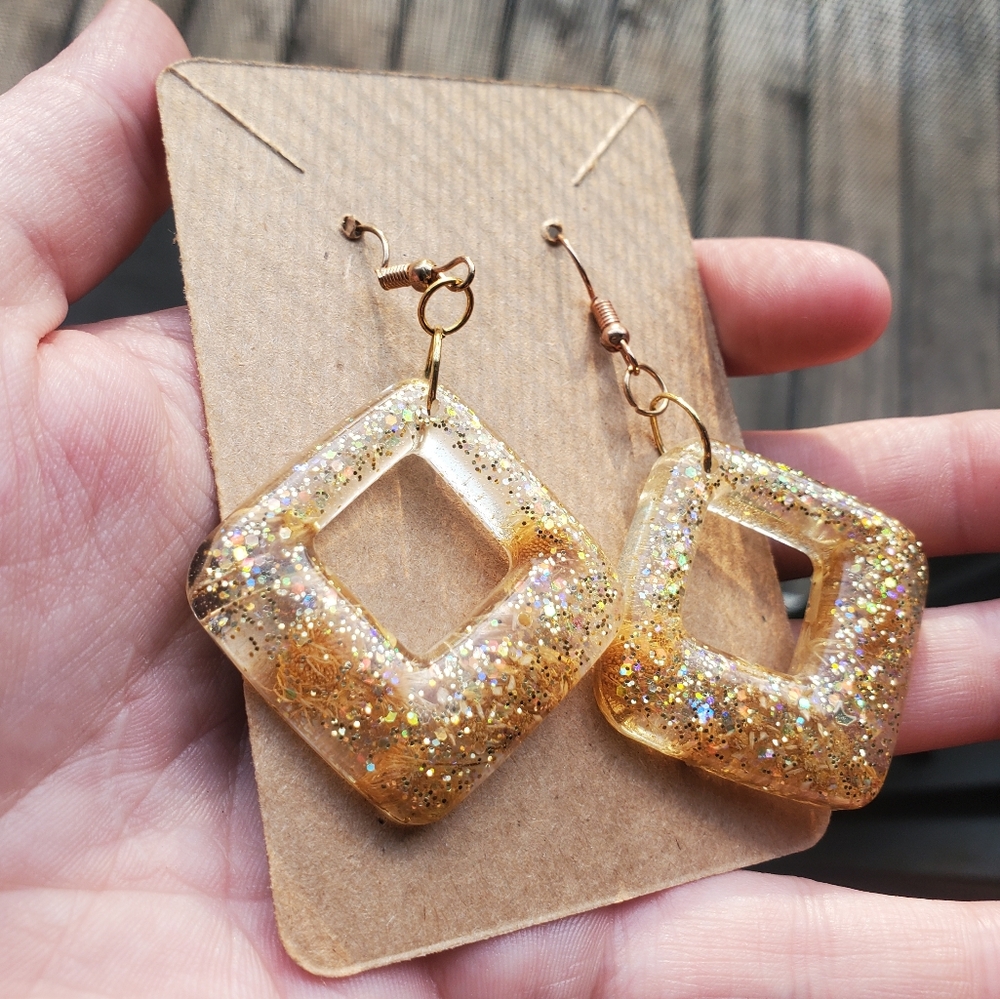 Flower and sparkle resin dangle earrings